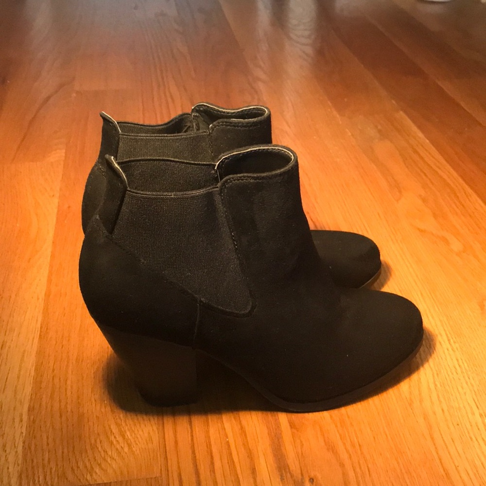 Black suede like ankle booties. Slightly worn.
